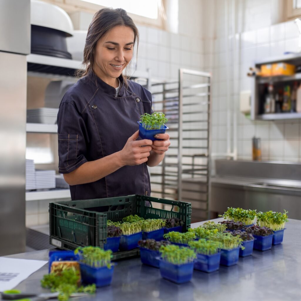 chef inspecting a delivery of fresh microgreens